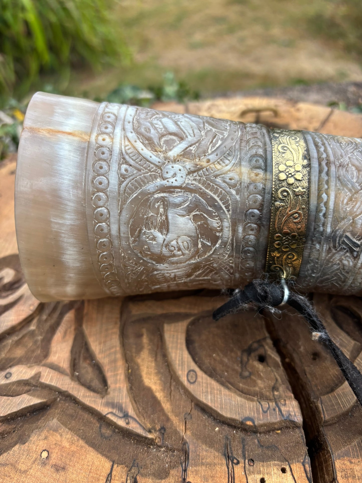 Bell end of Oliphant replica blowing horn showing carved detail
