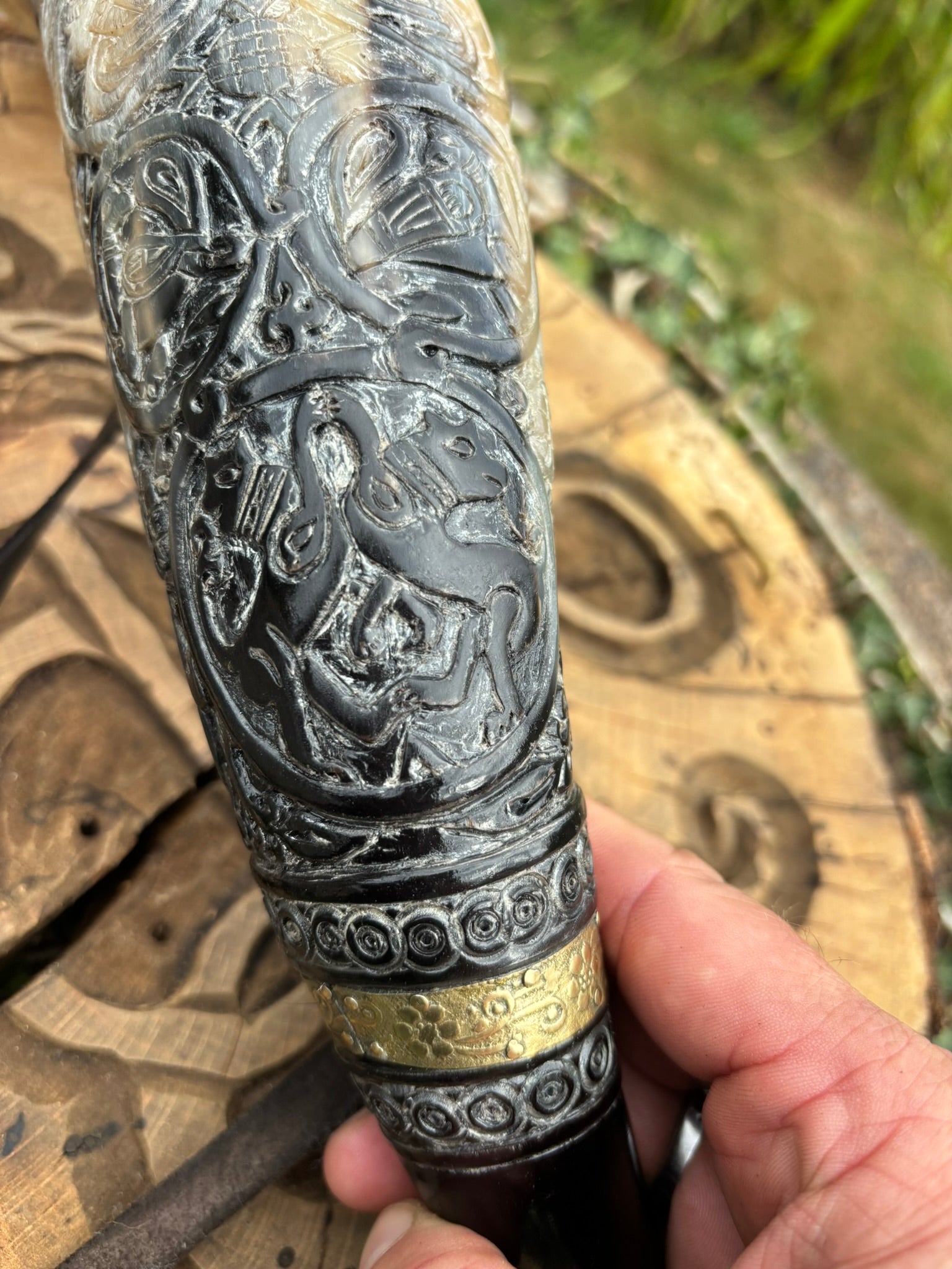 Intricate interlaced carving on Viking blowing horn, Oliphant replica, mid section
