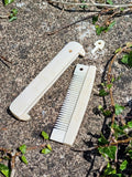 Handmade Viking bone comb detail showing authentic medieval craftsmanship