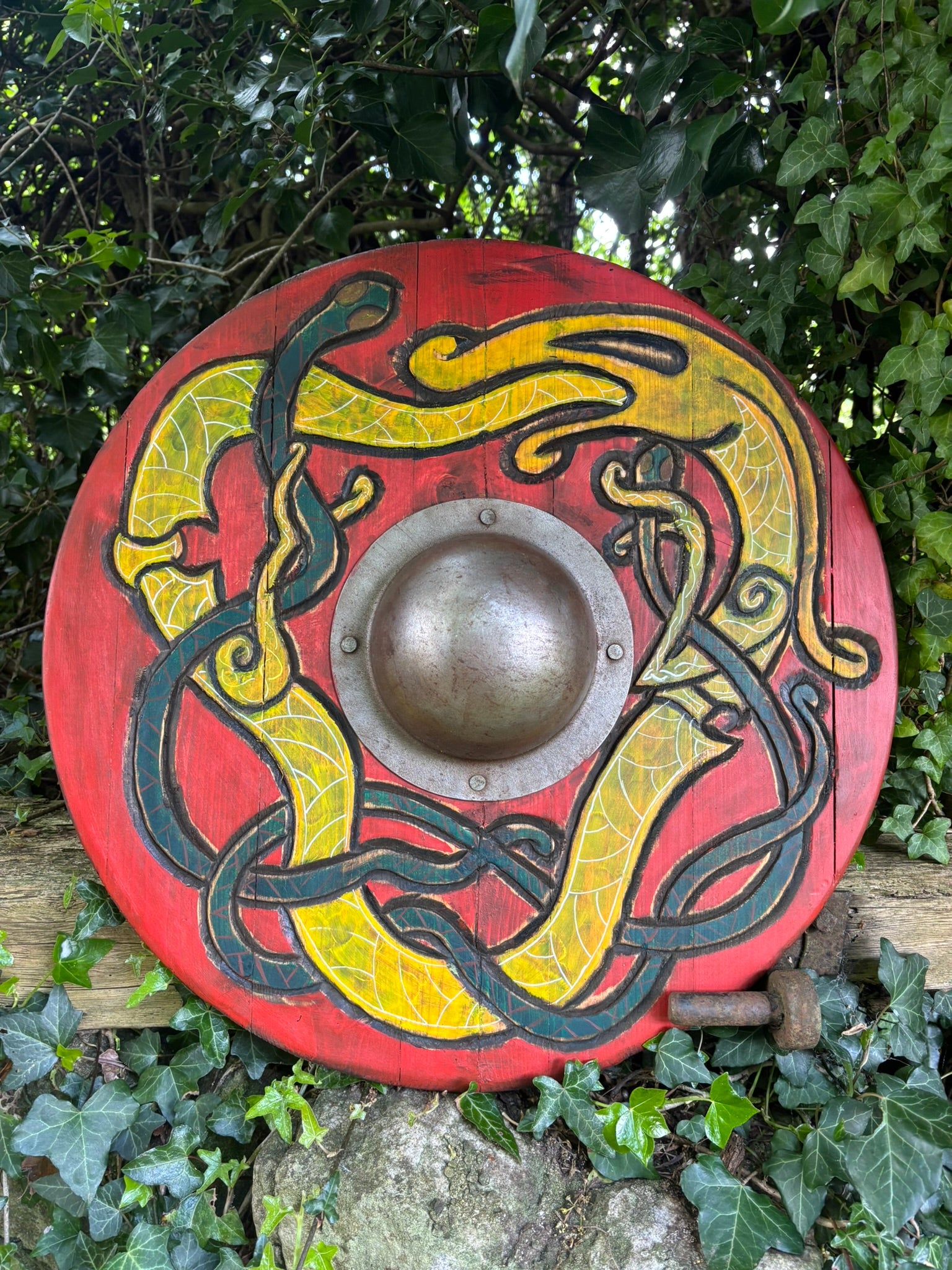 Urnes style carving on a 22" shield with a splash of colour