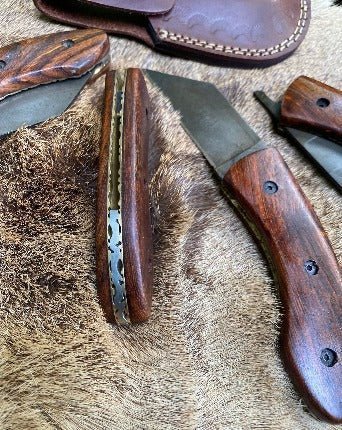Intricate patterning in brass on back of the Folding Seax Pocket Knife - Bushman Survival