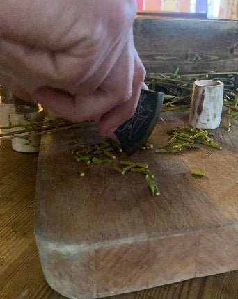 Kalahari Bush Axe - Bushman Survival, being used to chop herbs